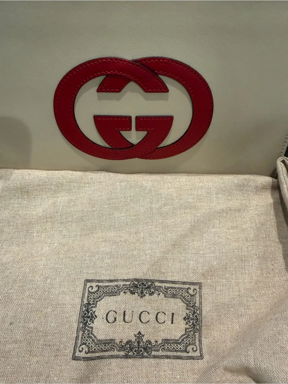 Authentic Gucci Cream Leather Zip Pouch with Red Double G Logo